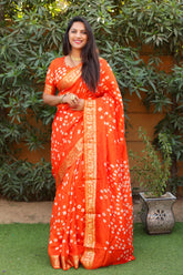 Orange Pure Silk Original Bandhani Saree With Zari Weaving Border