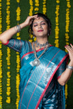Teal Pure Lichi Silk Banarasi Saree With Silver Zari Weaving