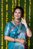 Teal Pure Lichi Silk Banarasi Saree With Silver Zari Weaving