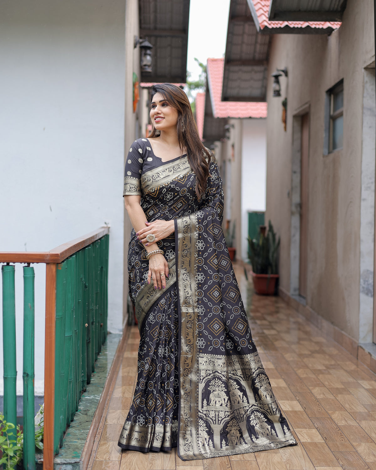 Black Handpicked Soft Dola Silk Bandhani Saree With Zari Weaving Design