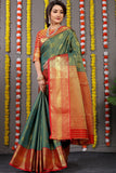 Pure Tissue Silk Green Kanjivaram Saree Contrast Jari With Figure Design