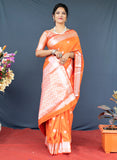 Orange Lichi Soft Silk Banarasi Saree With Silver Zari Weaving