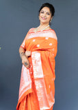 Orange Lichi Soft Silk Banarasi Saree With Silver Zari Weaving