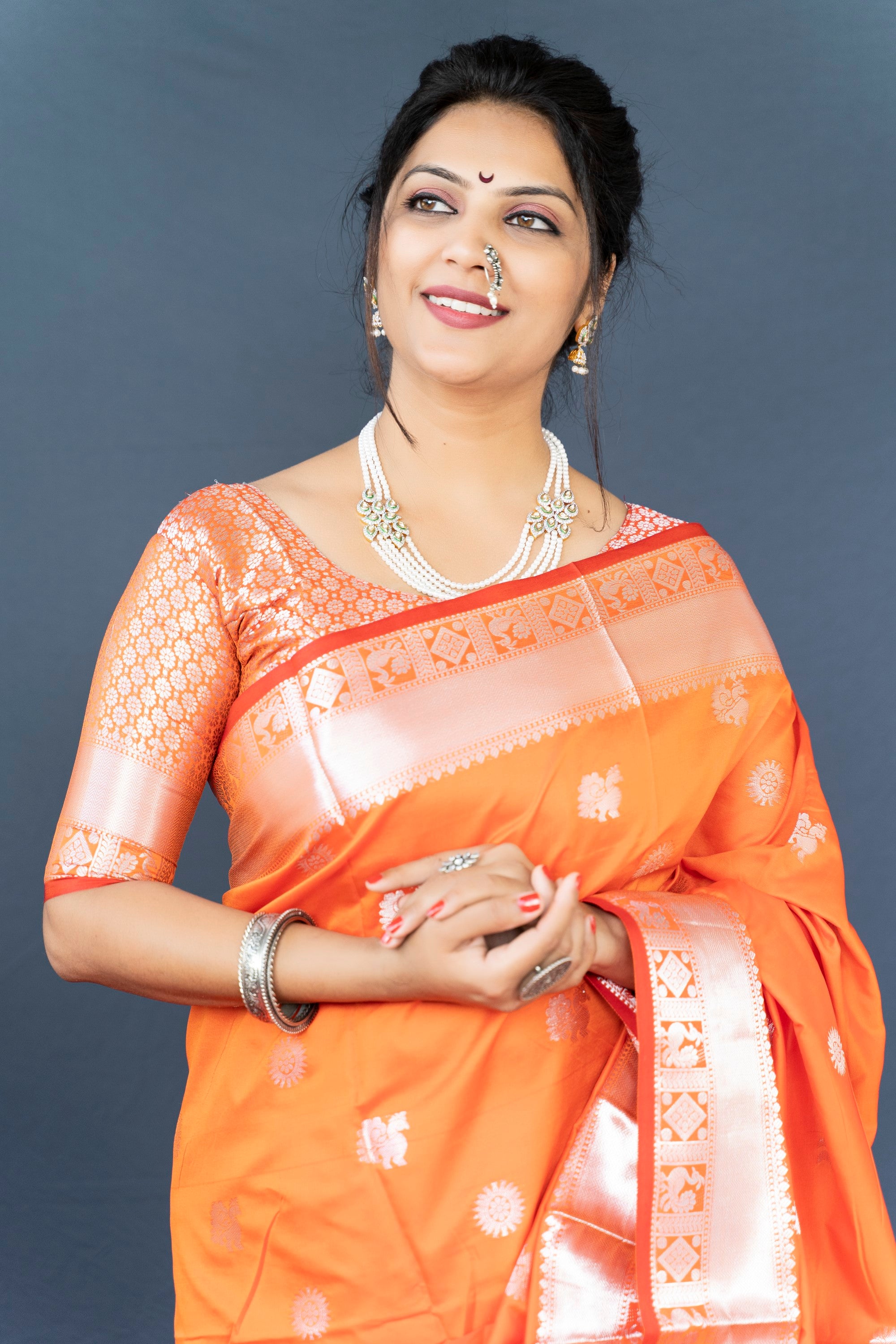 Orange Lichi Soft Silk Banarasi Saree With Silver Zari Weaving