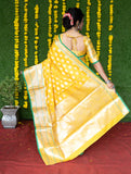 Yellow Pure Lichi Silk Banarasi Saree With Silver Zari Weaving